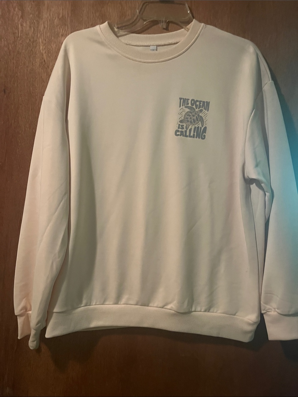 Source Unknown Cream Crewneck Sweatshirt with Blue Ocean Graphic